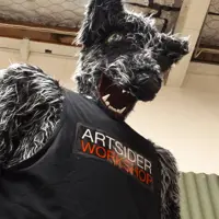 Wolf statue with Artsider Workshop T-shirt